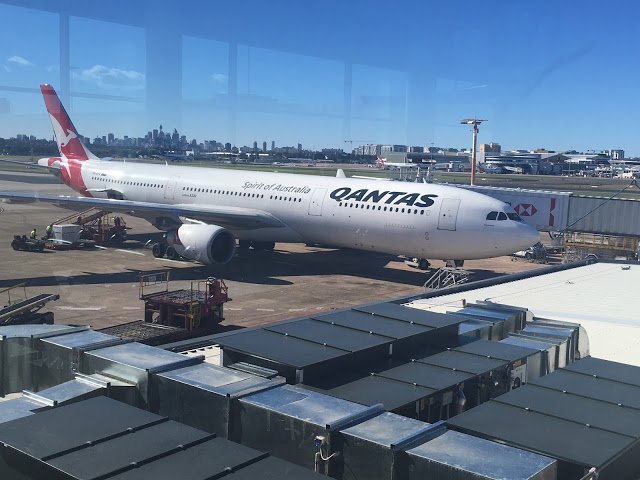 a large white airplane at an airport