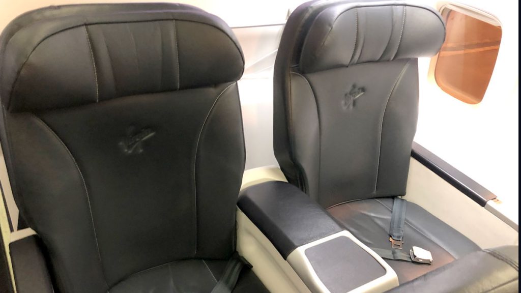 a black seats in a plane