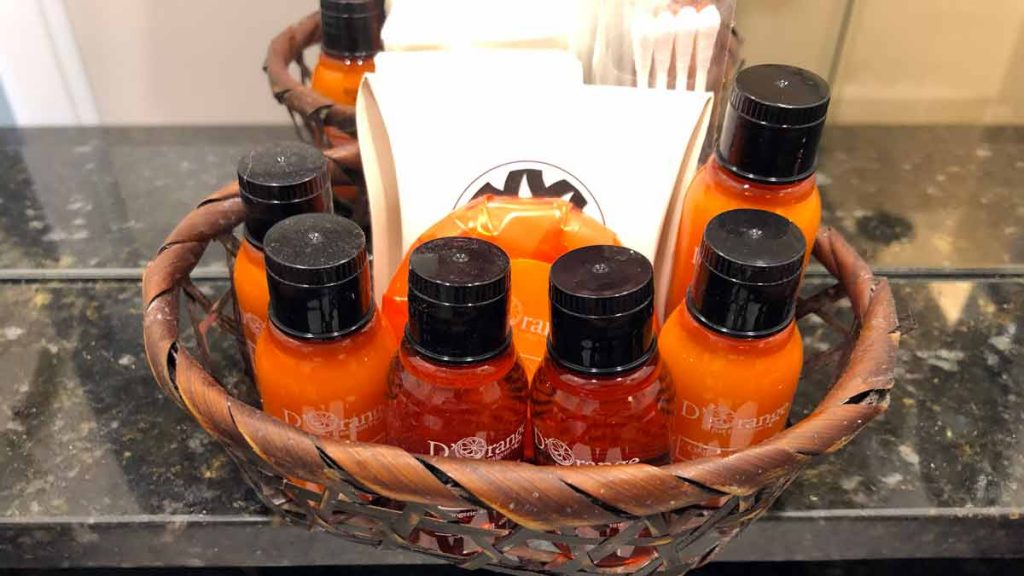 a basket of orange bottles