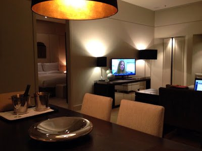 a room with a television and a table