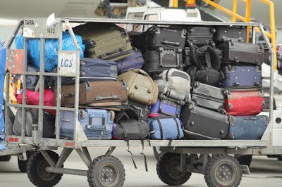 a cart full of luggage