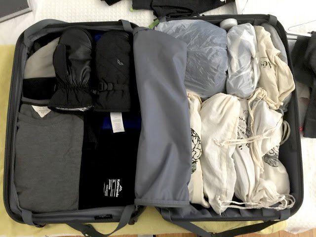 a suitcase with clothes in it