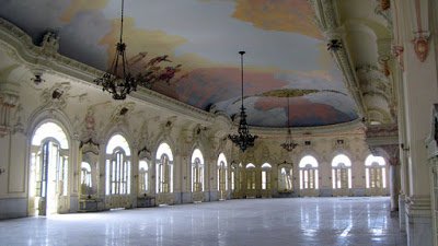 a large room with arched windows