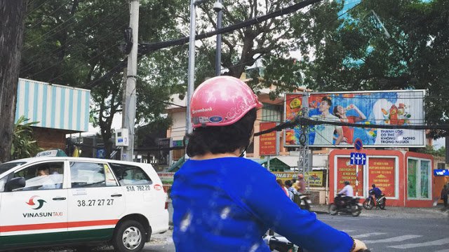 a person on a motorcycle wearing a helmet