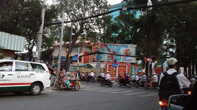 a group of people on motorcycles in a city