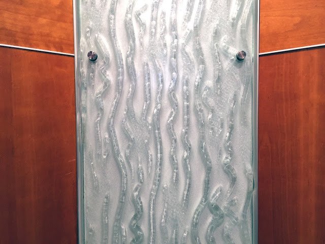a glass panel with a pattern on it