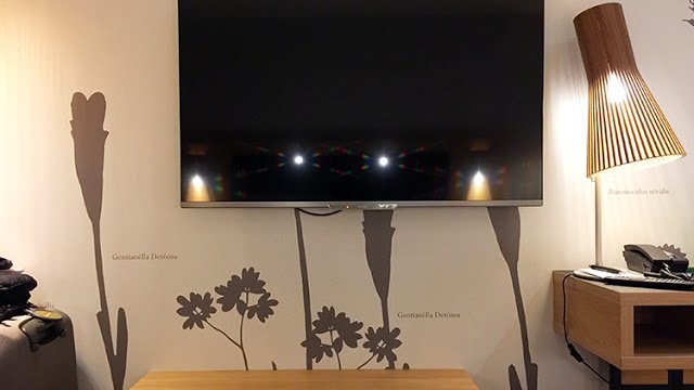 a tv mounted on a wall