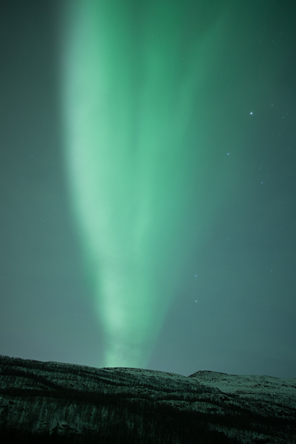 a green light in the sky