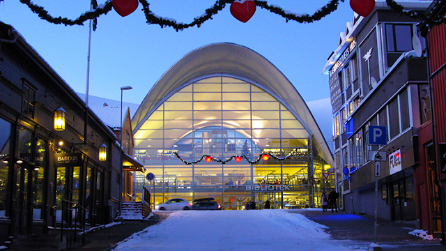 a building with a curved roof