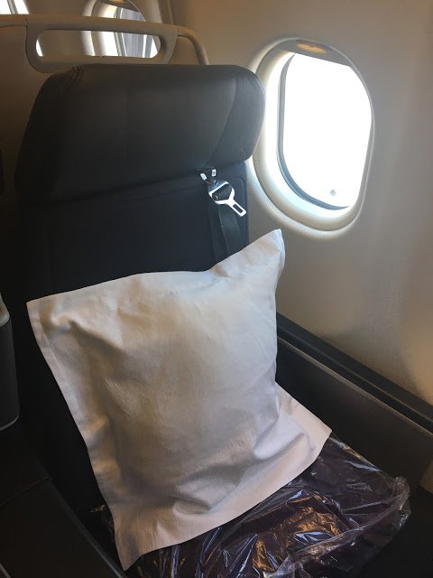 a pillow on a seat