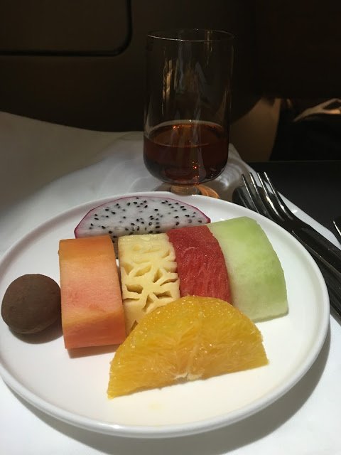 a plate of fruit on a table