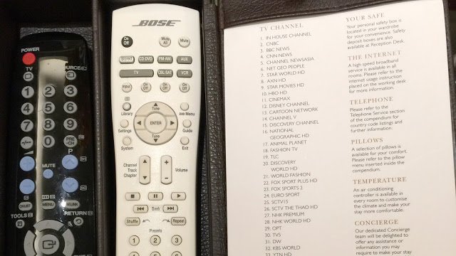 a remote control in a leather case