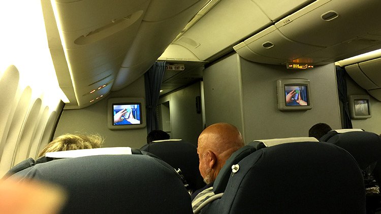 a group of people sitting in a plane