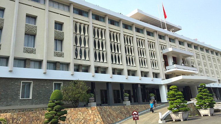 a building with a flag on the front