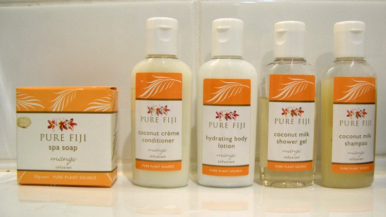 a group of bottles of body care