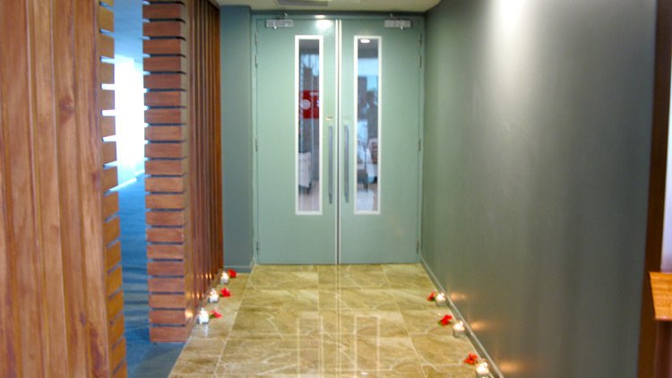 a glass doors in a hallway