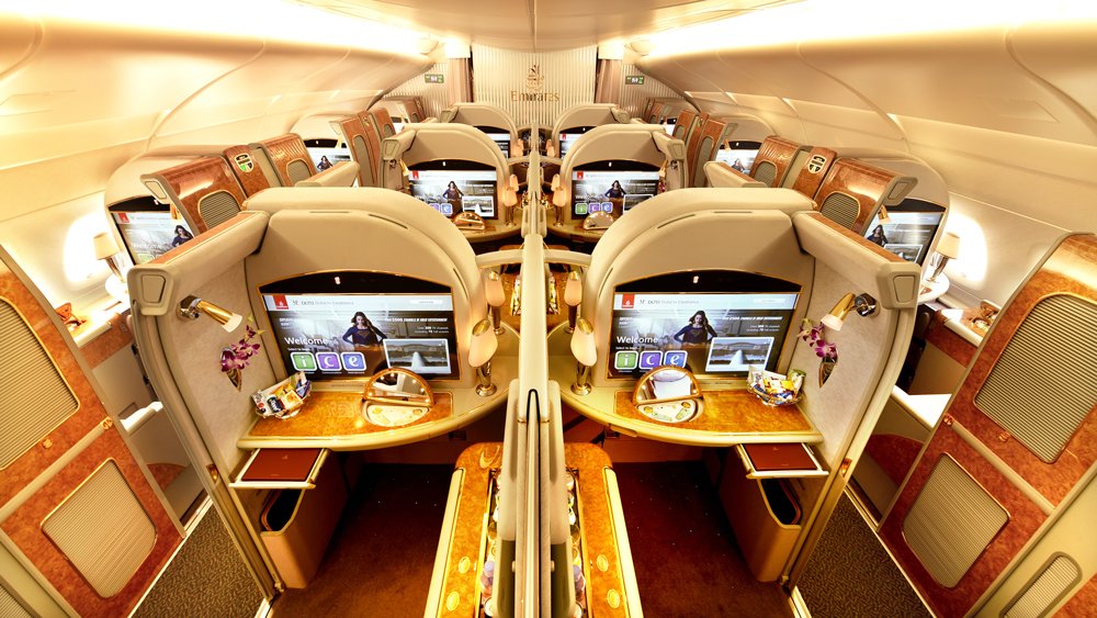 Emirates First Class dance of the seven veils ditches gold bling and faux walnut