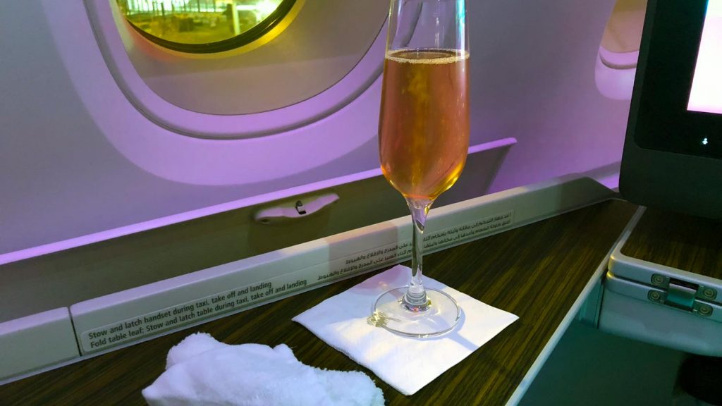 Qatar A380, a glass of rose champagne before departure [Schuetz/2PAXfly]