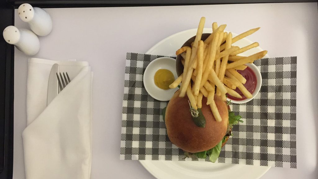 a burger and fries on a plate