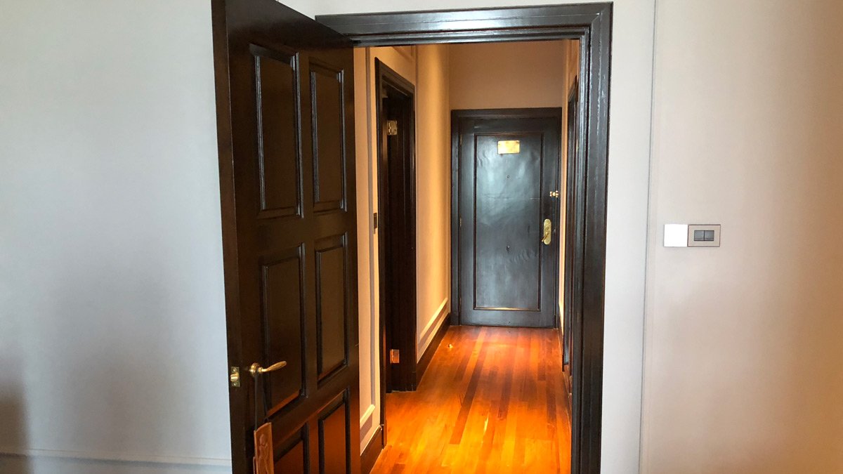 a hallway with two doors