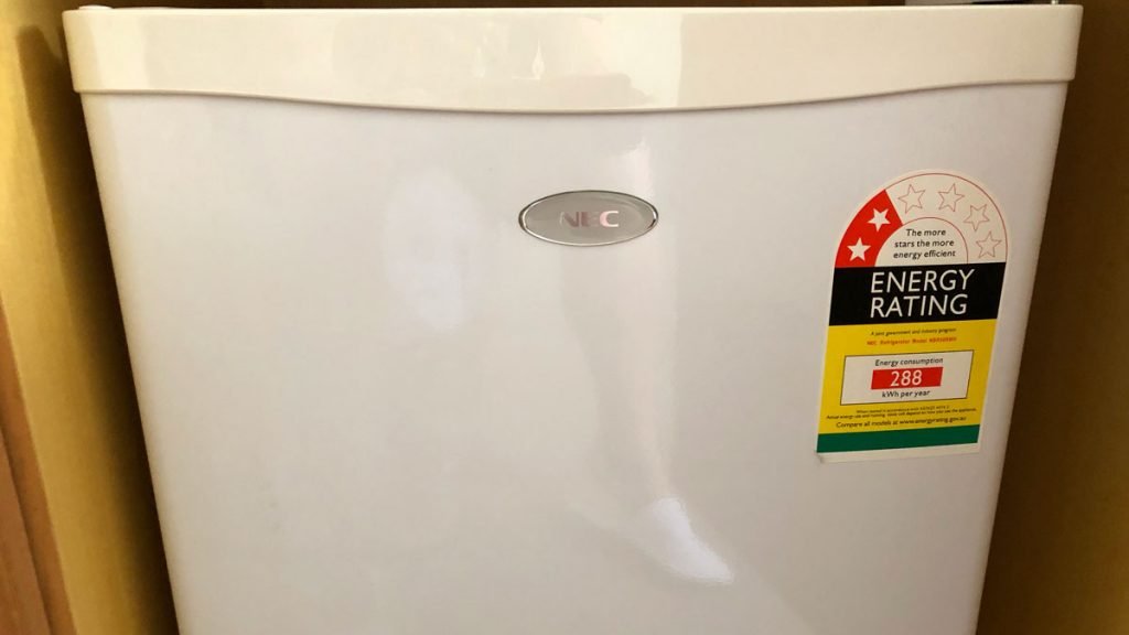 a white refrigerator with a label