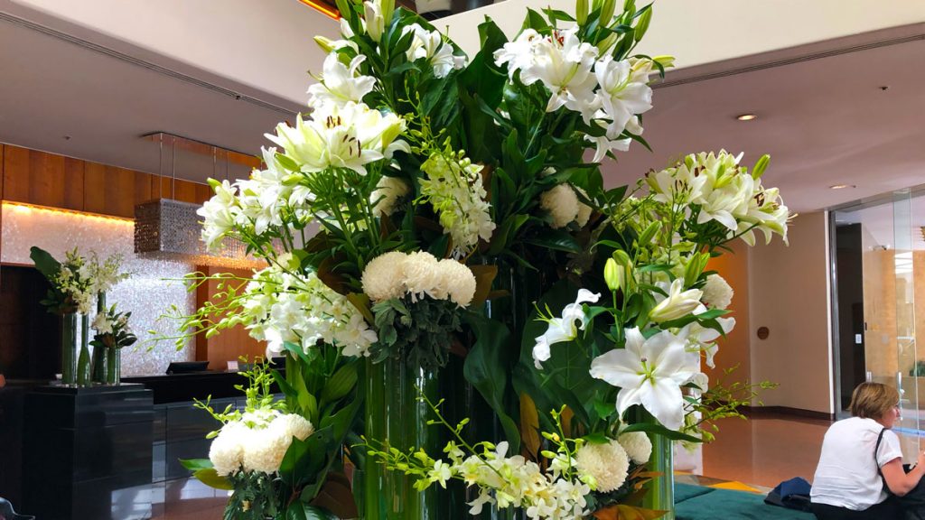 a vase of flowers in a room