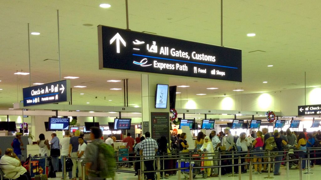 a group of people in an airport