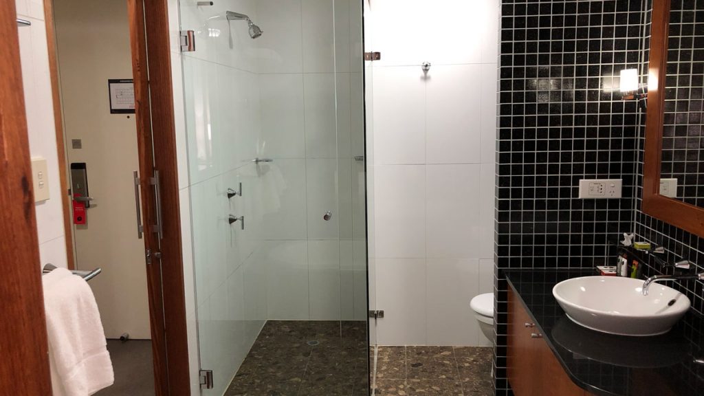 a bathroom with a glass shower