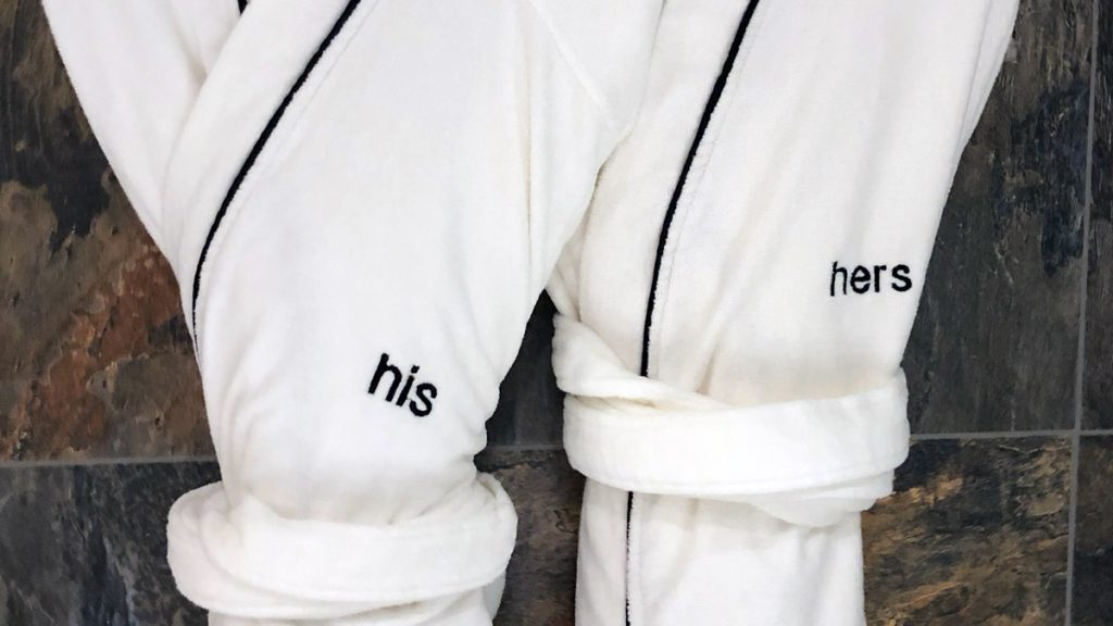 a white robe with black text