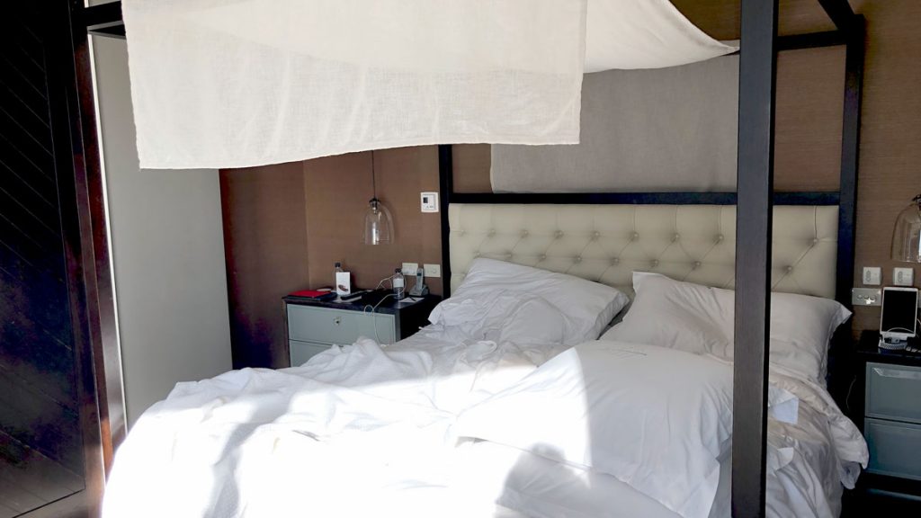 a bed with a canopy over it