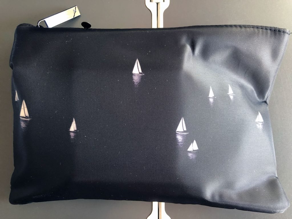 a black bag with sailboats on it