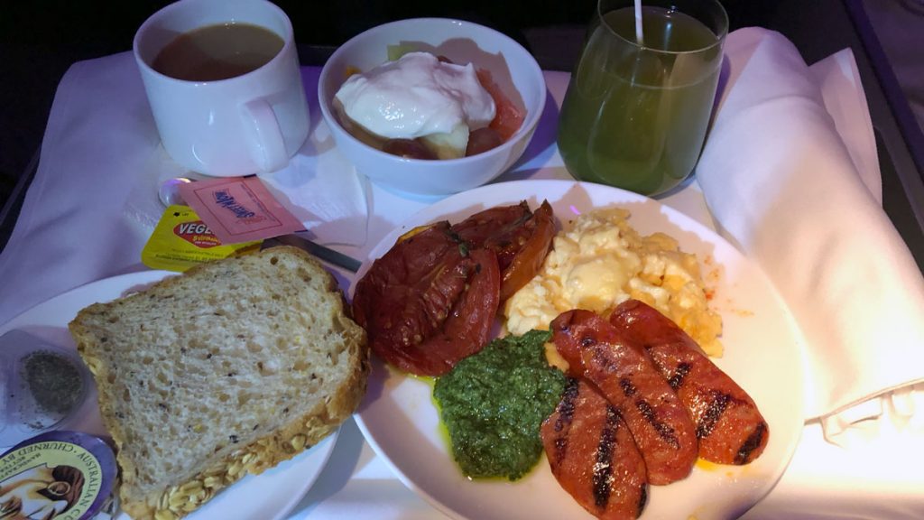 a plate of food and drinks on a table