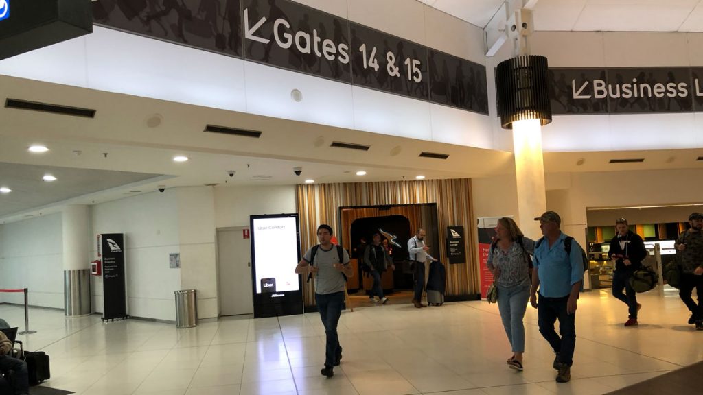 a group of people walking in a building