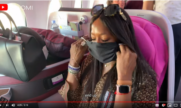 Naomi Campbell pointlessly cleans her Qatar business class seat