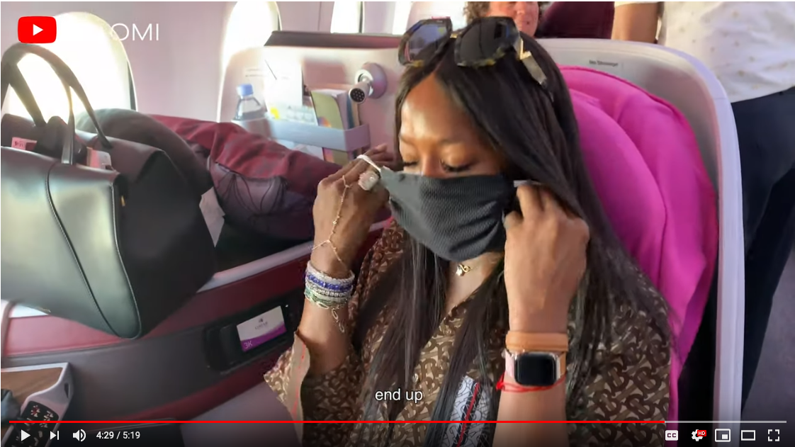 Naomi Campbell pointlessly cleans her Qatar business class seat
