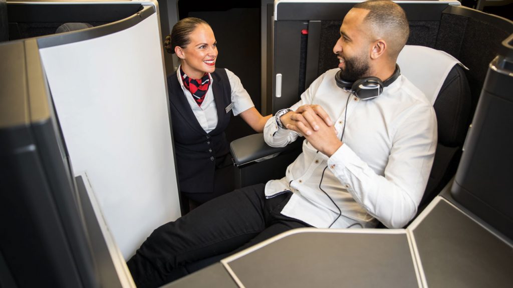 a man and woman in an airplane