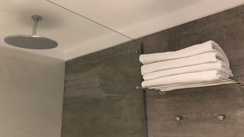 a towel rack with towels on it