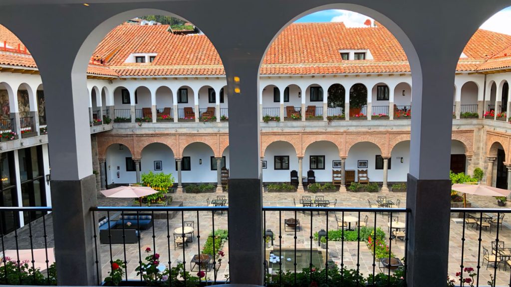 a view of a courtyard from a balcony
