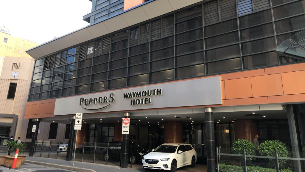 a building with cars parked outside