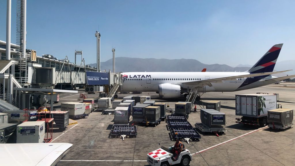 a large white airplane at an airport