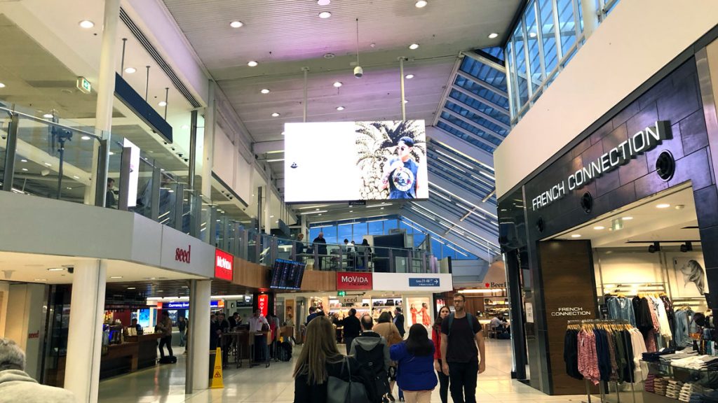 a group of people in a mall