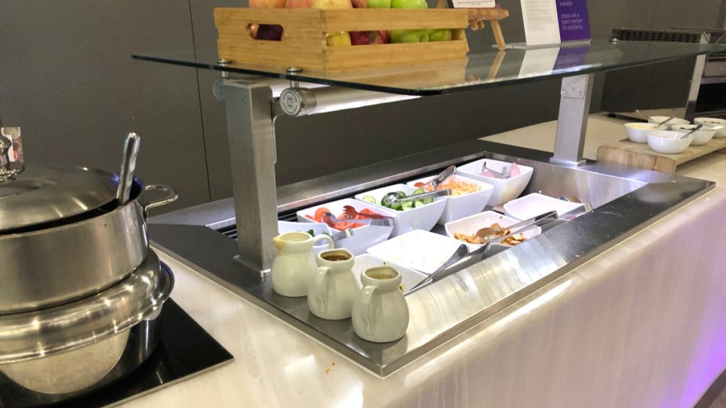 a buffet line with food on the counter