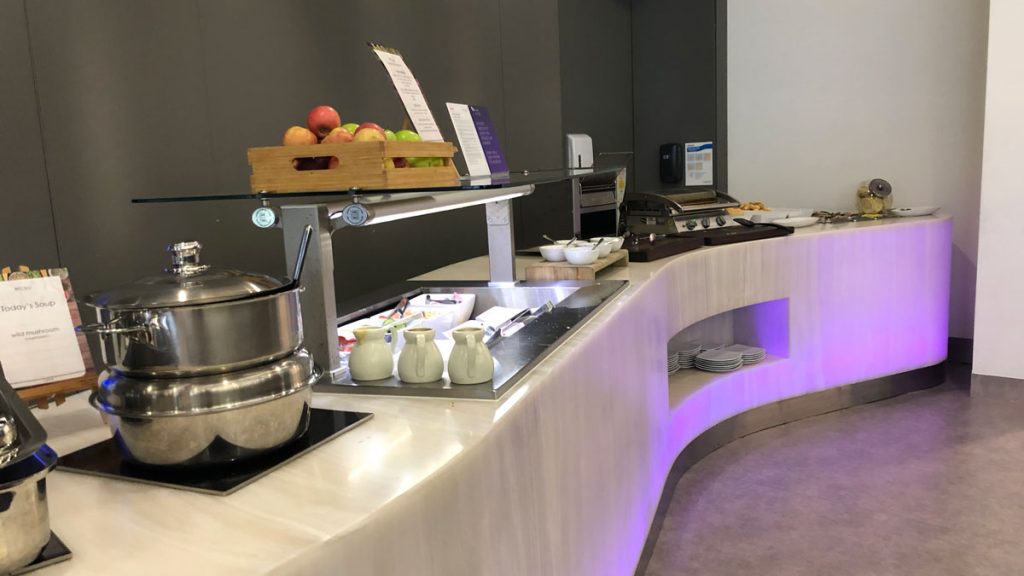 a buffet with fruit on a counter