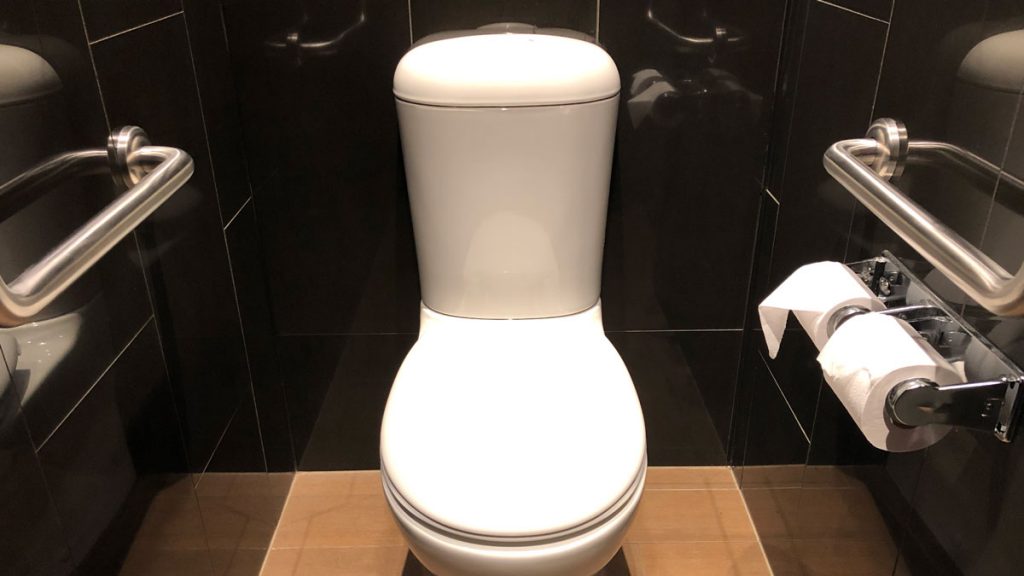 a white toilet in a bathroom