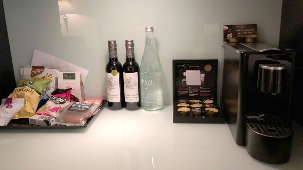a group of bottles of wine and a package of coffee