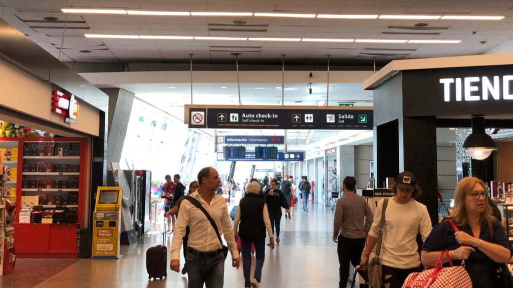 people walking in a airport