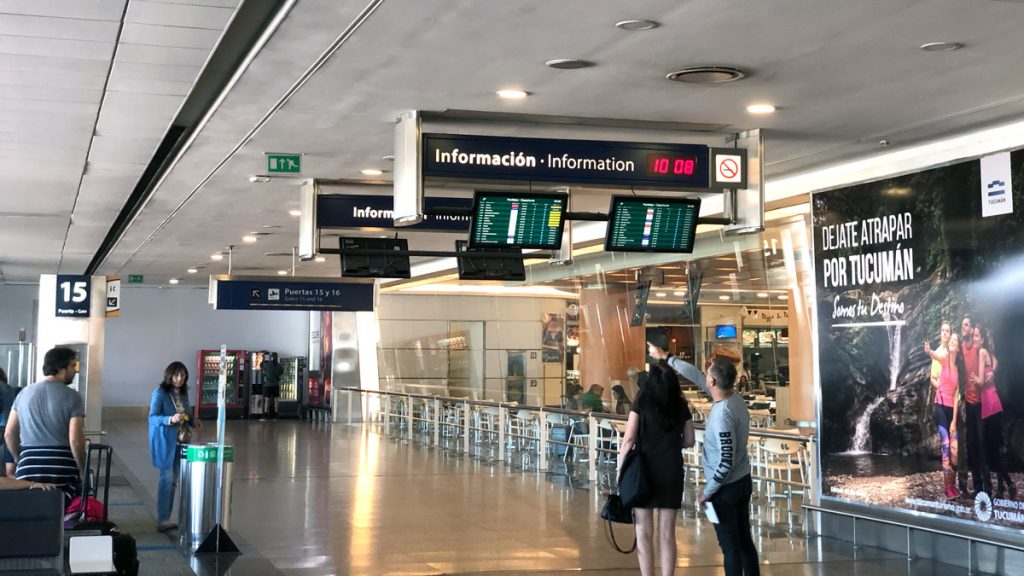 people in a terminal with a group of people