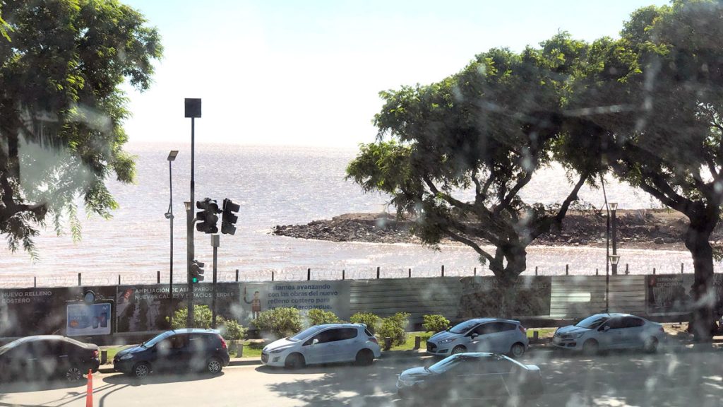 a view of a beach from a window