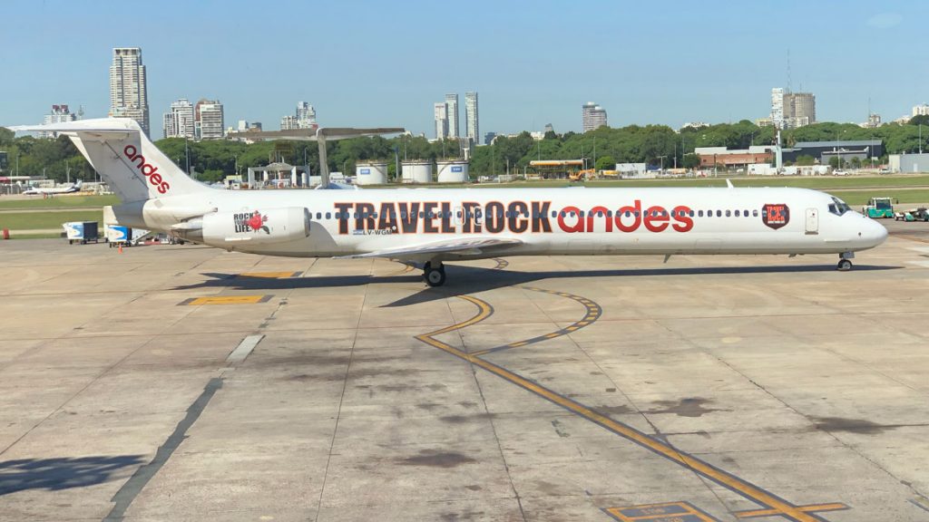 a white airplane on a runway