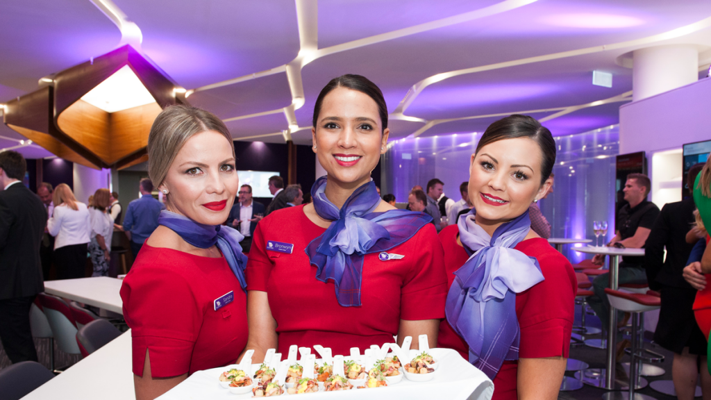 a group of women wearing red uniforms